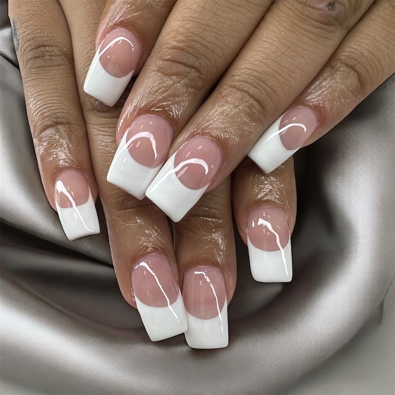 Elegant white French manicure at 305 Nail Spa